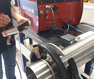 Achieving high quality welds with an orbital power supply