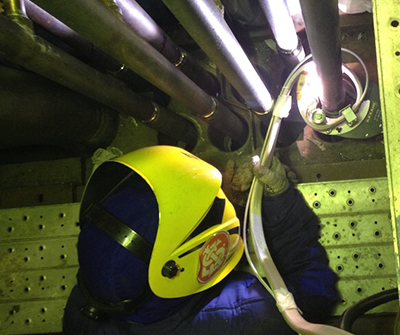What is the role of gases in orbital TIG welding?