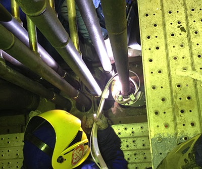 When to use an open head in orbital welding?